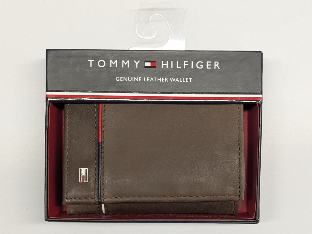 Tommy Hilfiger brown leather wallet in packaging on a white background