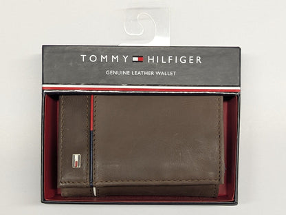 Tommy Hilfiger brown leather wallet in packaging on a white background