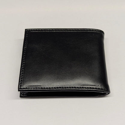 Black leather wallet on a light gray background