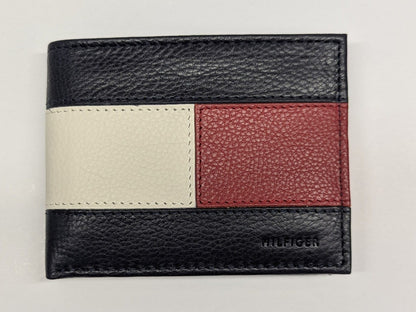 Multicolored leather wallet with 'Tommy Hilfiger' branding on a light gray background