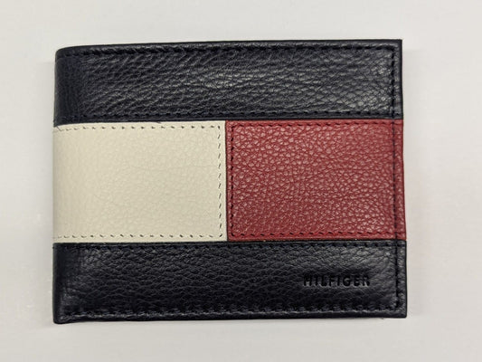 Multicolored leather wallet with 'Tommy Hilfiger' branding on a light gray background