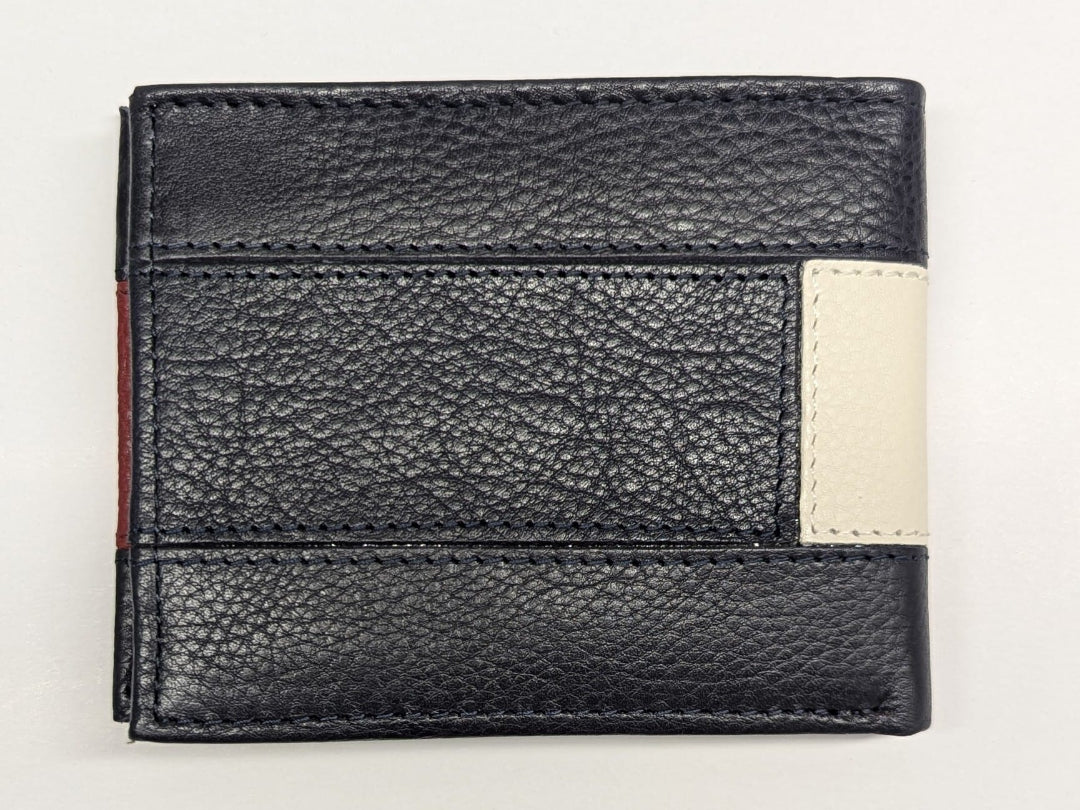 Black leather wallet with a beige patch on a light gray background