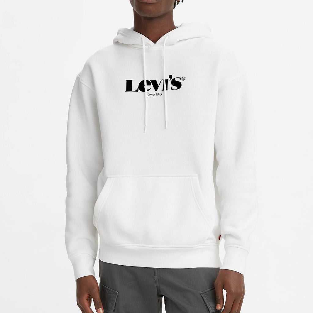 Person wearing a white hoodie with Levi's logo on a light gray background