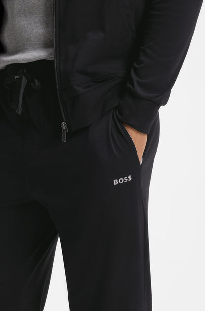 Black tracksuit with 'BOSS' logo on a white background