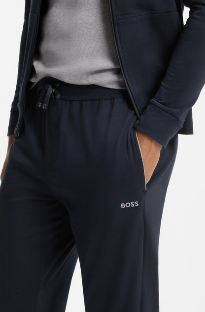 Navy tracksuit with 'BOSS' logo on a white background