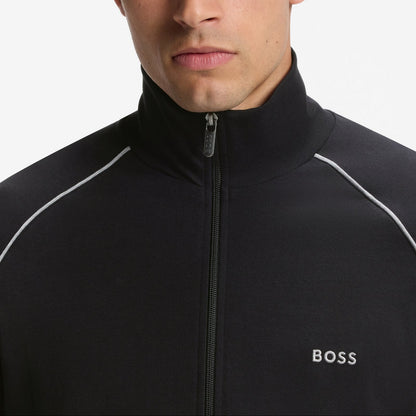 Man wearing a black jacket with 'BOSS' logo on a white background