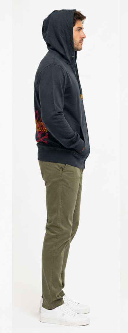 Person wearing a dark hoodie with a colorful design on a white background