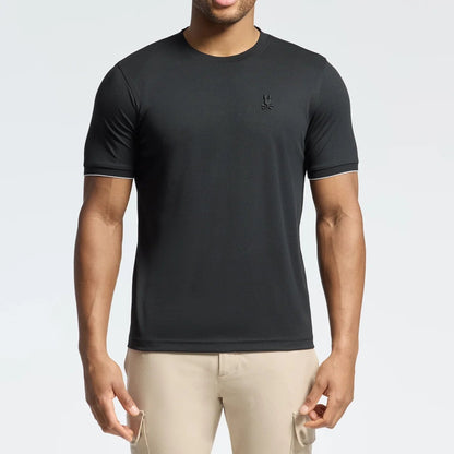 Man wearing a black t-shirt with a logo on a light gray background