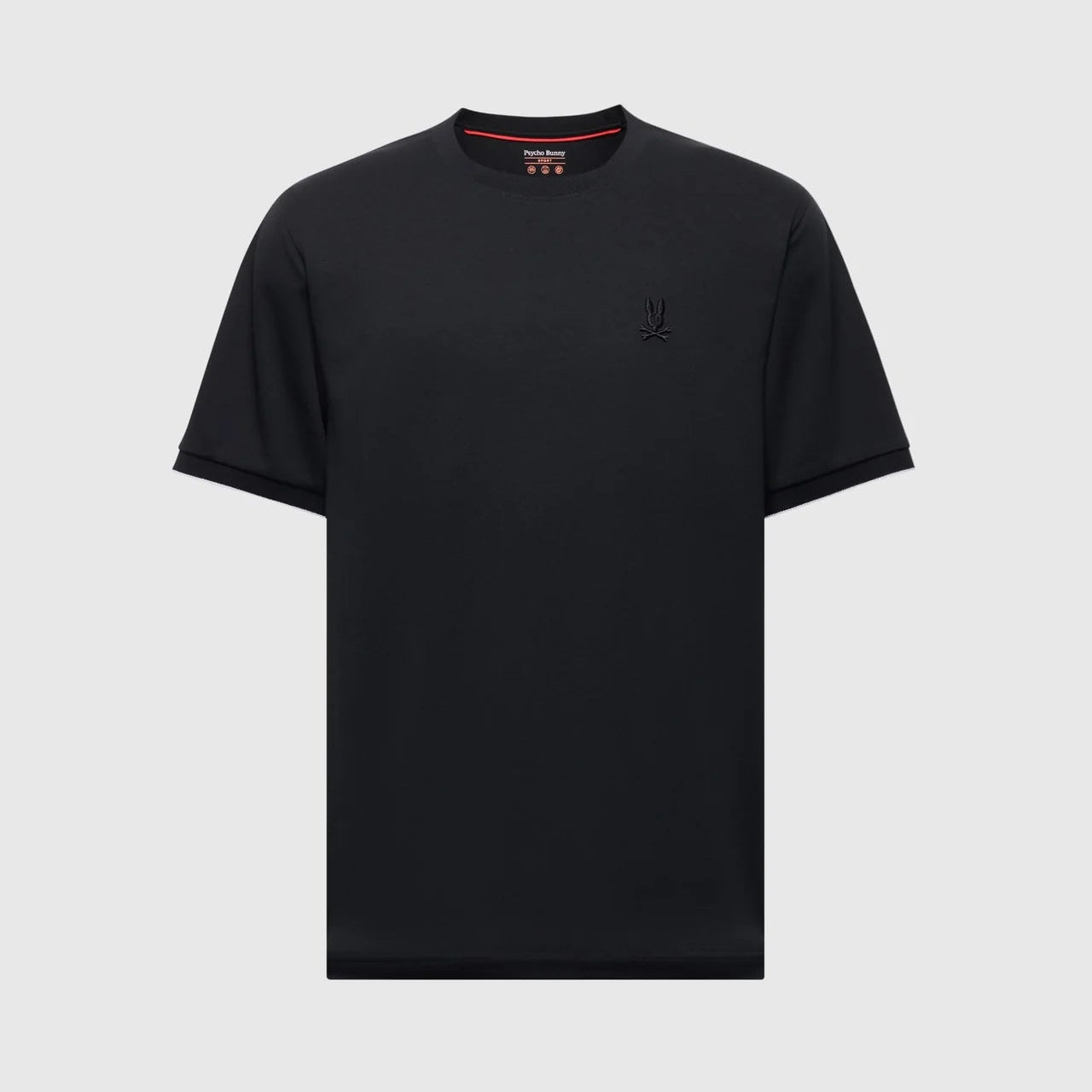 Black t-shirt with a small logo on a light gray background