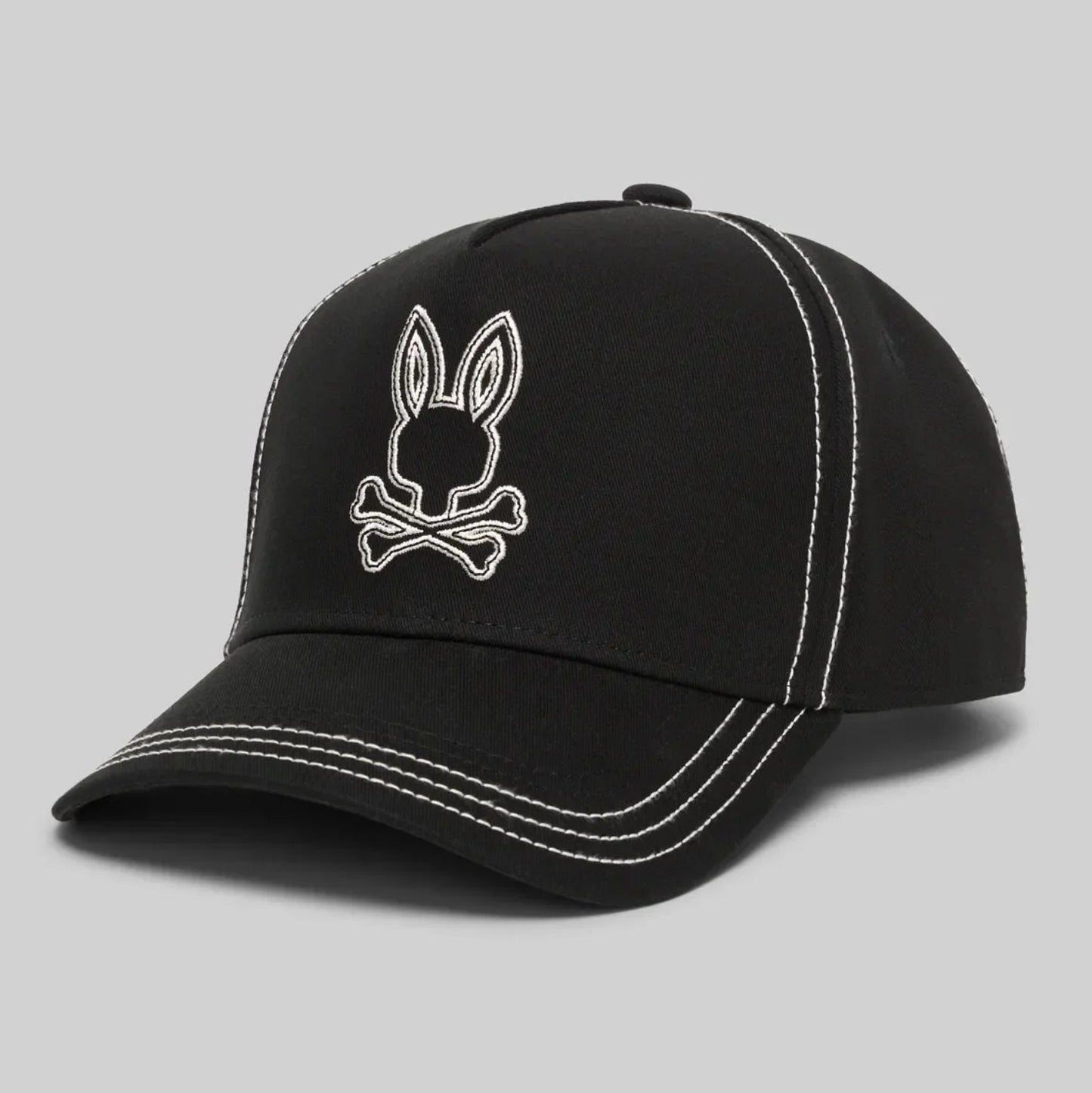 Black cap with a white embroidered logo on a gray background