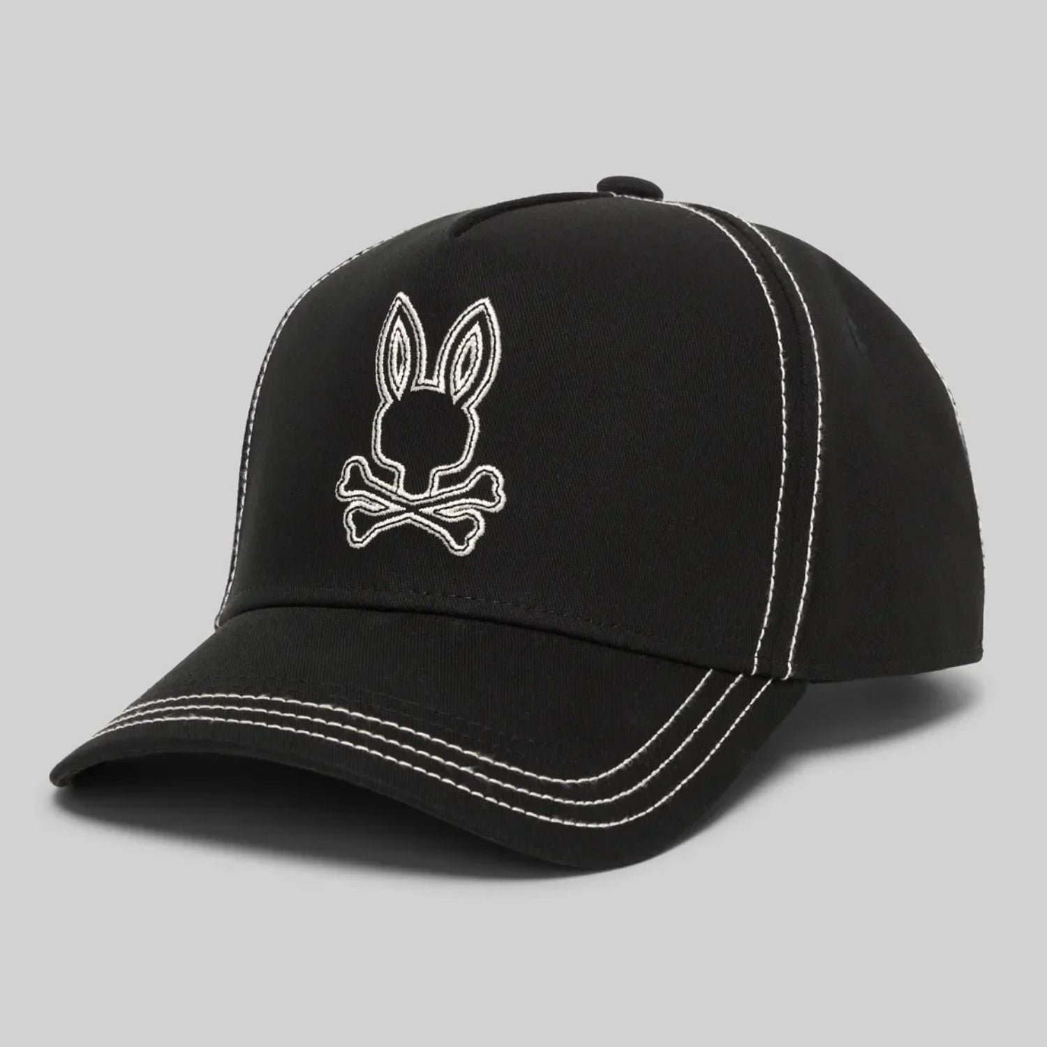 Black cap with a white embroidered logo on a gray background